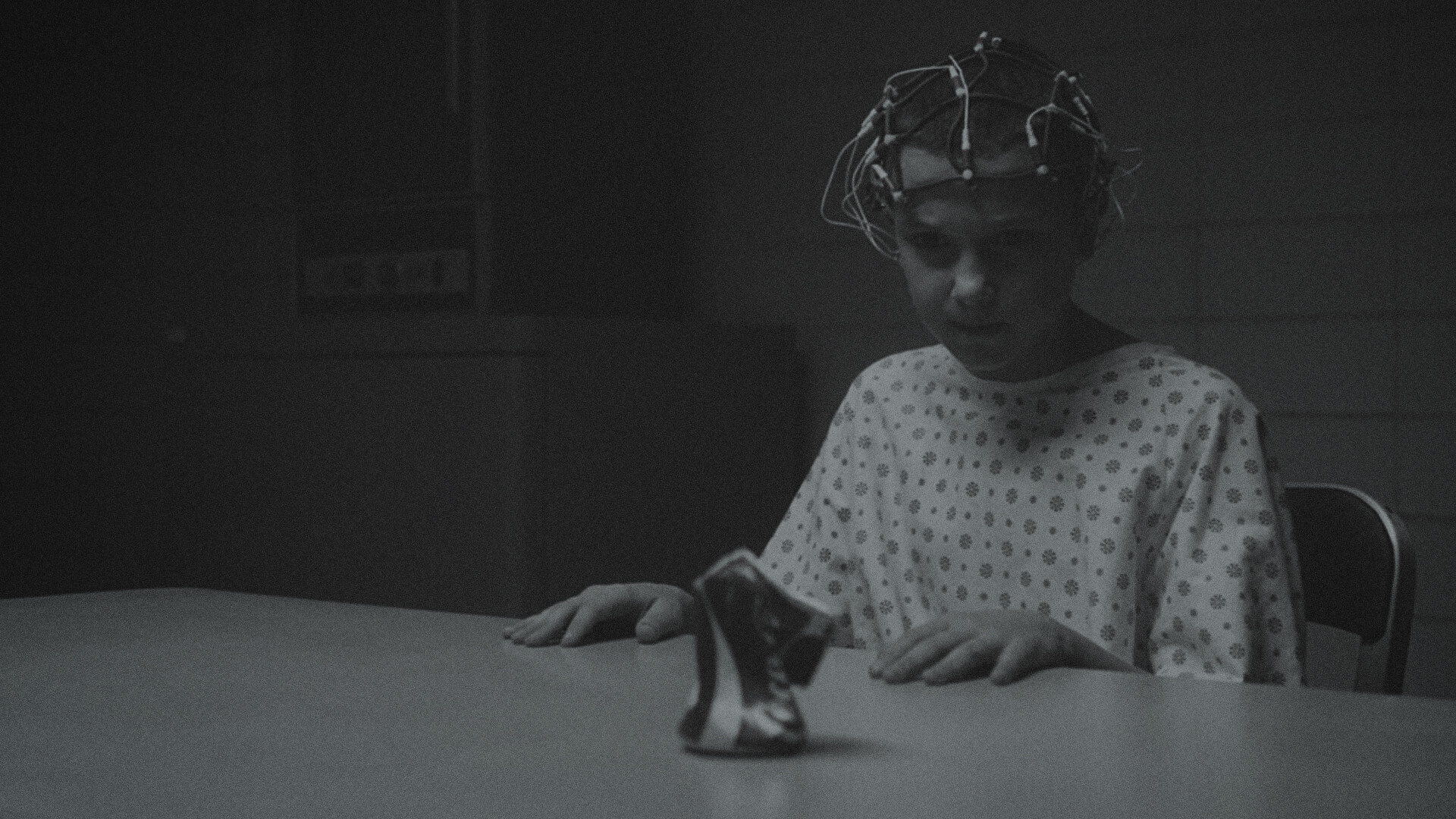 Eleven telekinetically crushing a coke can.