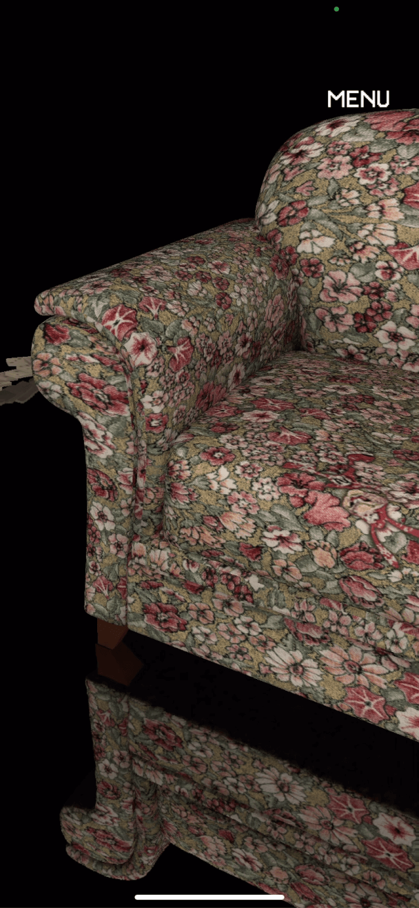 Old school couch in the Stranger Things void environment, with elaborate floral pattern featuring the hidden Domino's Noid character.